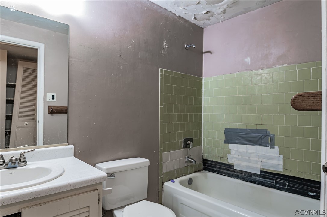 9333 Carbe Road North Chesterfield, VA 23236 - Photo 22 of 34 a bathroom with a sink a toilet and shower