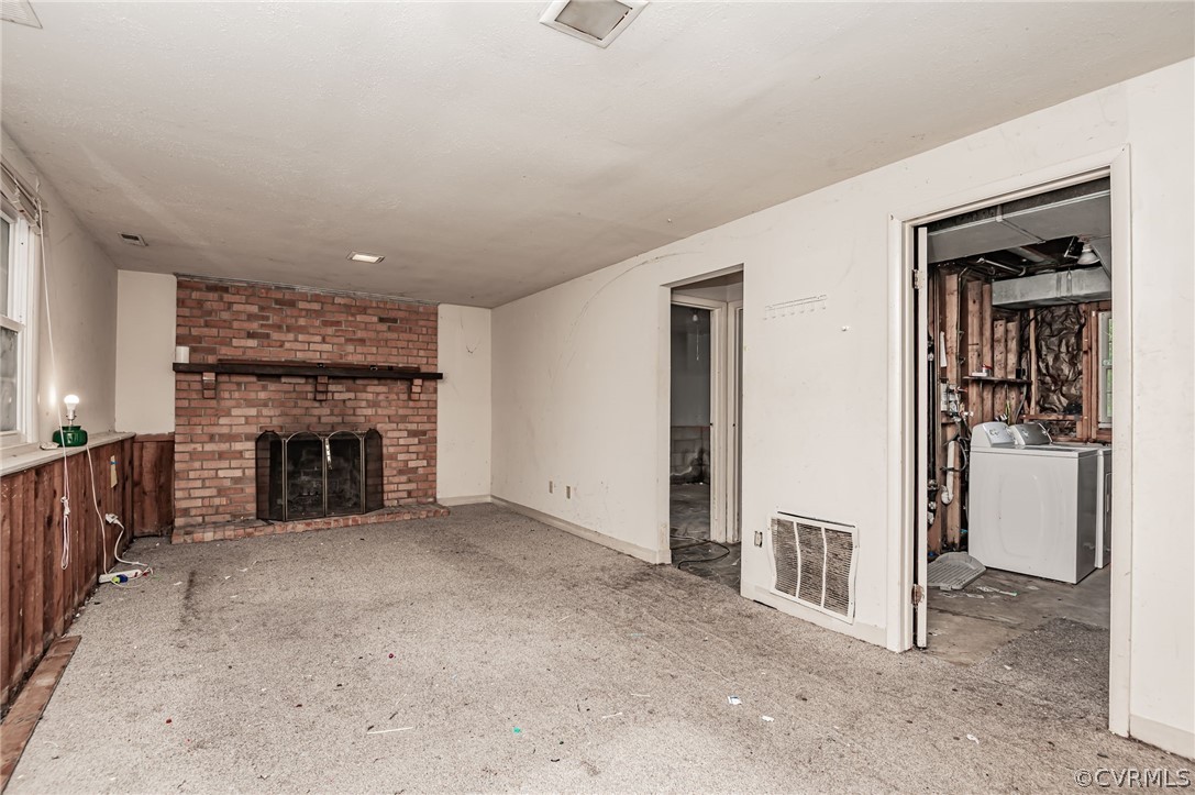 9333 Carbe Road North Chesterfield, VA 23236 - Photo 23 of 34 a view of a livingroom with an empty space and a fireplace