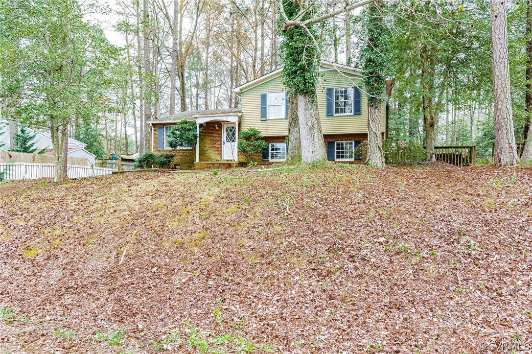 9333 Carbe Road North Chesterfield, VA 23236 - Photo 30 of 34 front view of a house with a dry yard