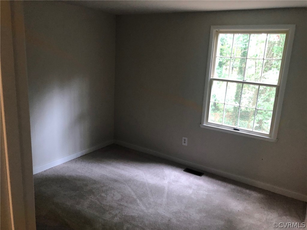 9333 Carbe Road North Chesterfield, VA 23236 - Photo 33 of 34 an empty room with a window