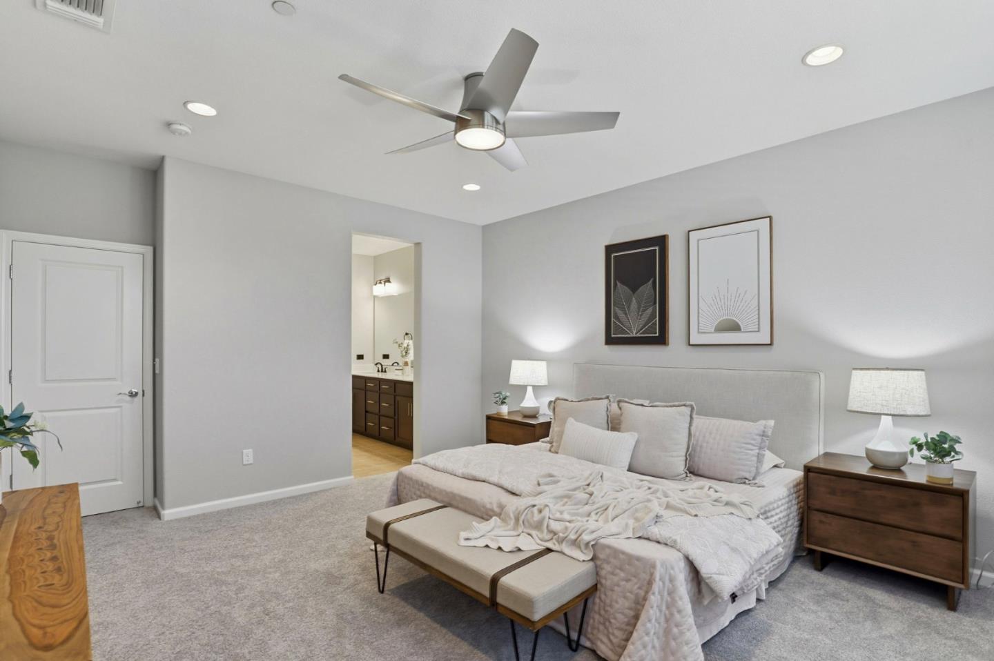 172 East Main Avenue Morgan Hill, CA 95037 - Photo 16 of 36 a bedroom with a bed and a chandelier