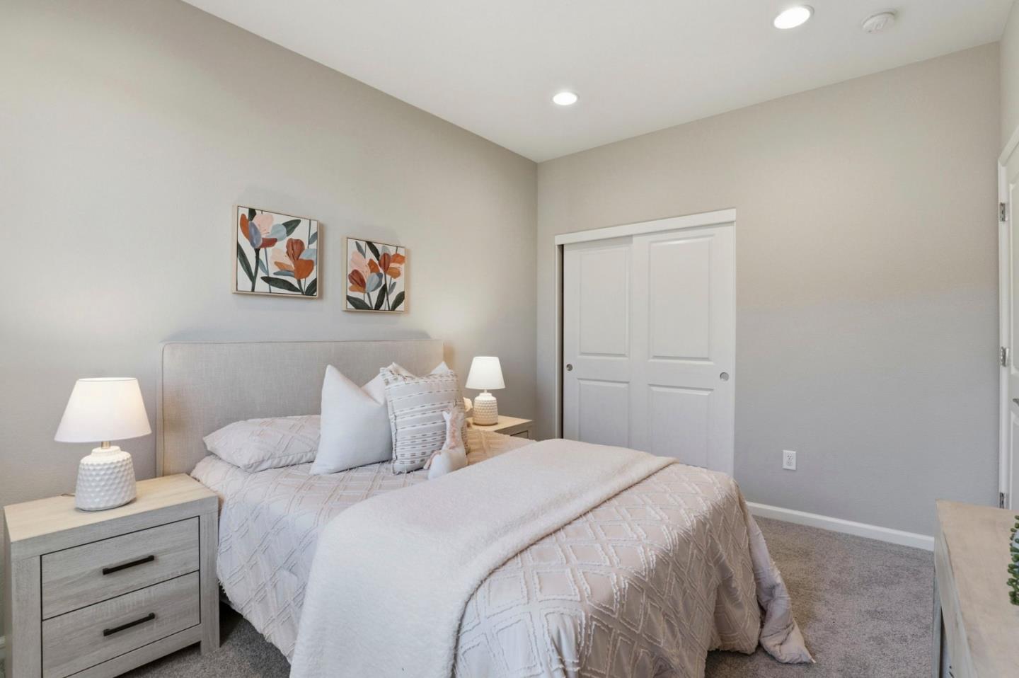 172 East Main Avenue Morgan Hill, CA 95037 - Photo 20 of 36 a bedroom with a bed and a couch