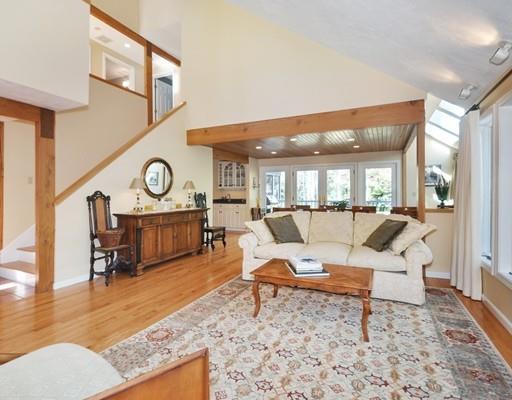 1115 North Road Carlisle, MA 01741 - Photo 12 of 30 a living room with furniture and a clock
