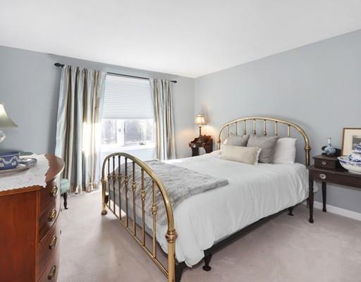 1115 North Road Carlisle, MA 01741 - Photo 16 of 30 a bedroom with a bed and a window