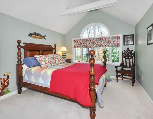 1115 North Road Carlisle, MA 01741 - Photo 18 of 30 a bedroom with bed and a chandelier