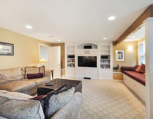 1115 North Road Carlisle, MA 01741 - Photo 27 of 30 a living room with furniture and a flat screen tv