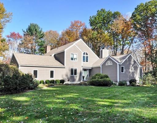 1115 North Road Carlisle, MA 01741 - Photo 29 of 30 a front view of a house with a garden