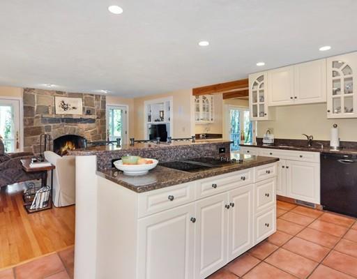 1115 North Road Carlisle, MA 01741 - Photo 8 of 30 a kitchen with a sink stove and cabinets