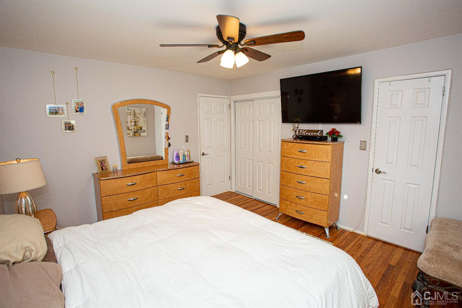 50 Harvard Road Old Bridge, NJ 08859 - Photo 22 of 44 a bedroom with a bed and a flat screen tv