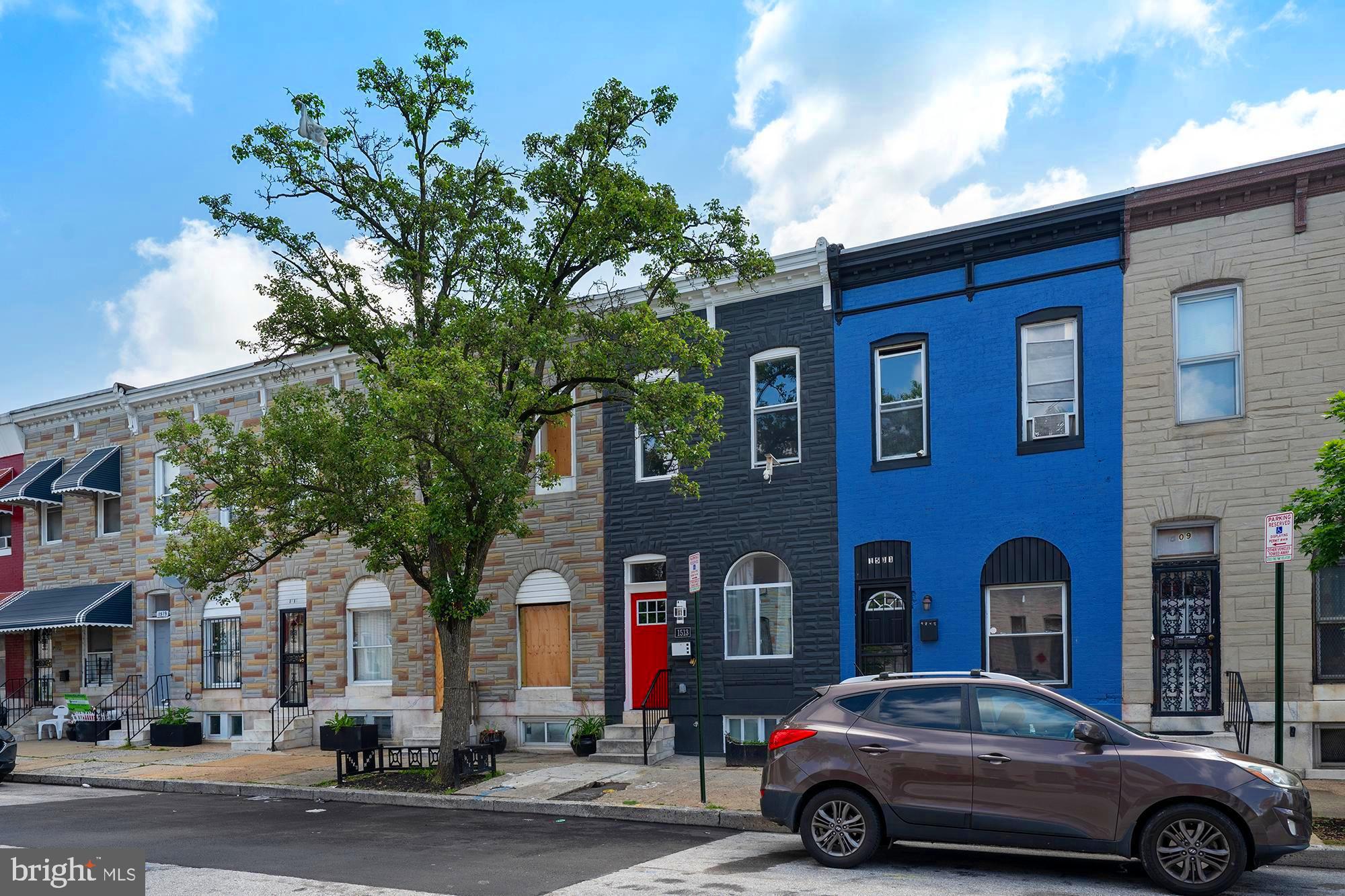 1513 North Wolfe Street Baltimore, MD 21213 - Photo 31 of 33 a car parked in front of a building