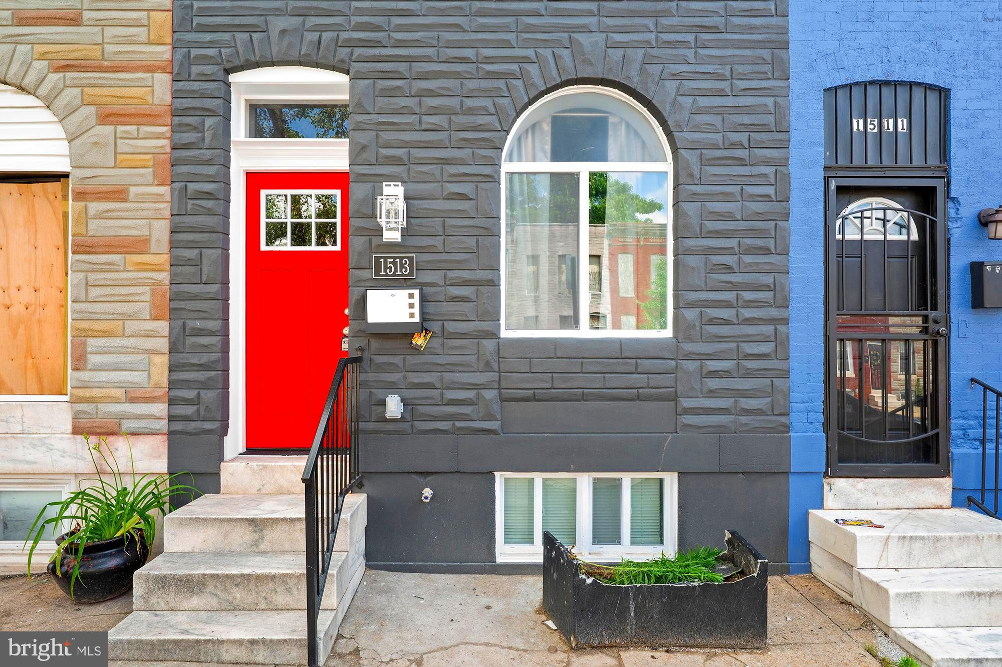 1513 North Wolfe Street Baltimore, MD 21213 - Photo 33 of 33 a front view of a house with a yard