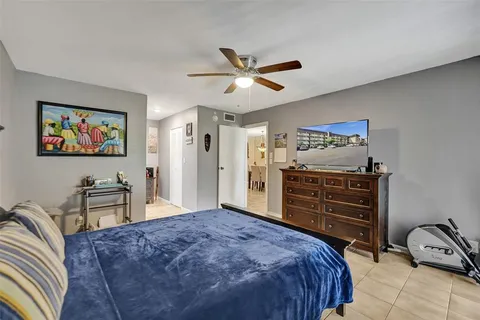 a view of a chairs and table in a room