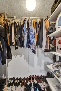 a view of swimming pool with seating area