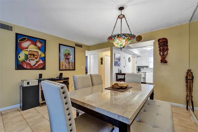 a view of a dining room with furniture