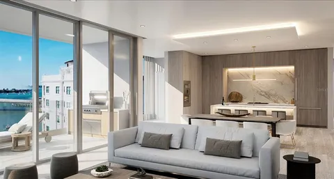 a living room with furniture and a table