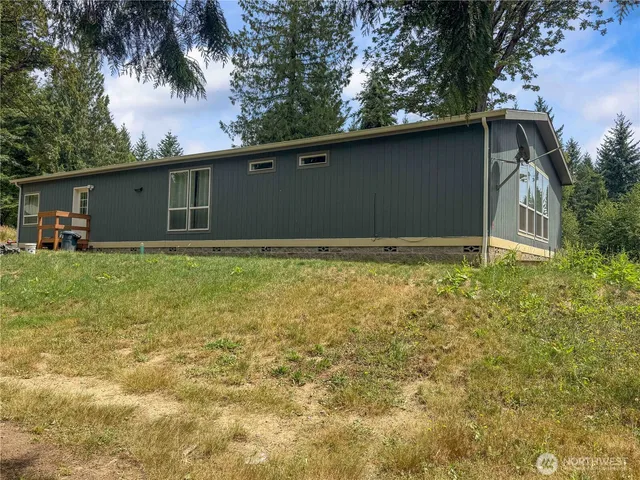 a house with trees in front of it