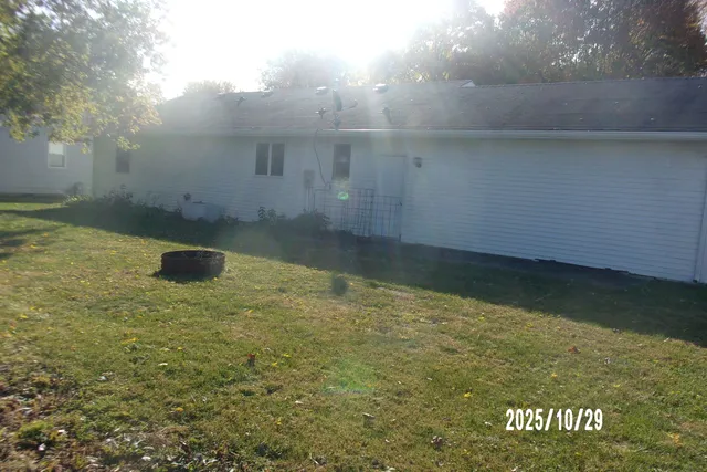 a backyard of a house with lots of green space