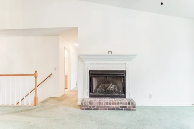 a living room with a fireplace