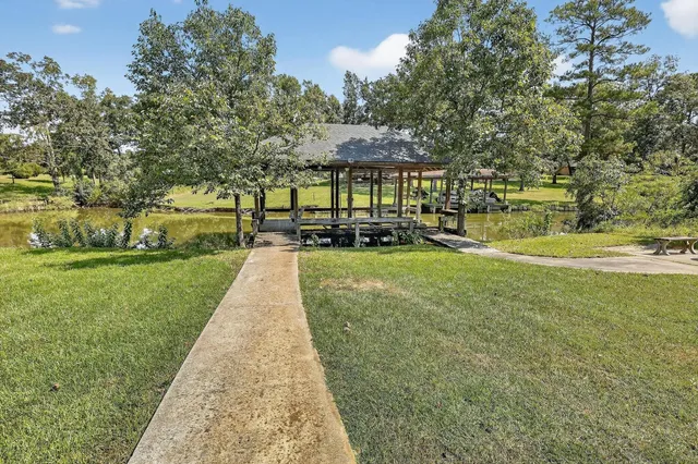 a view of a balcony with wooden floor and stairs