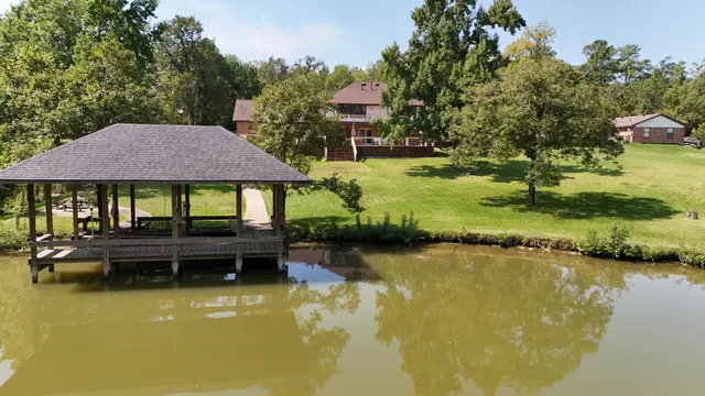 a view of a balcony with wooden floor