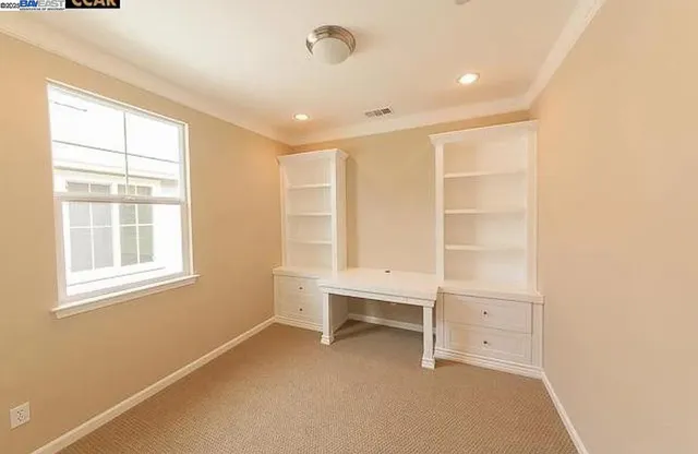 a bathroom with a sink and a large mirror