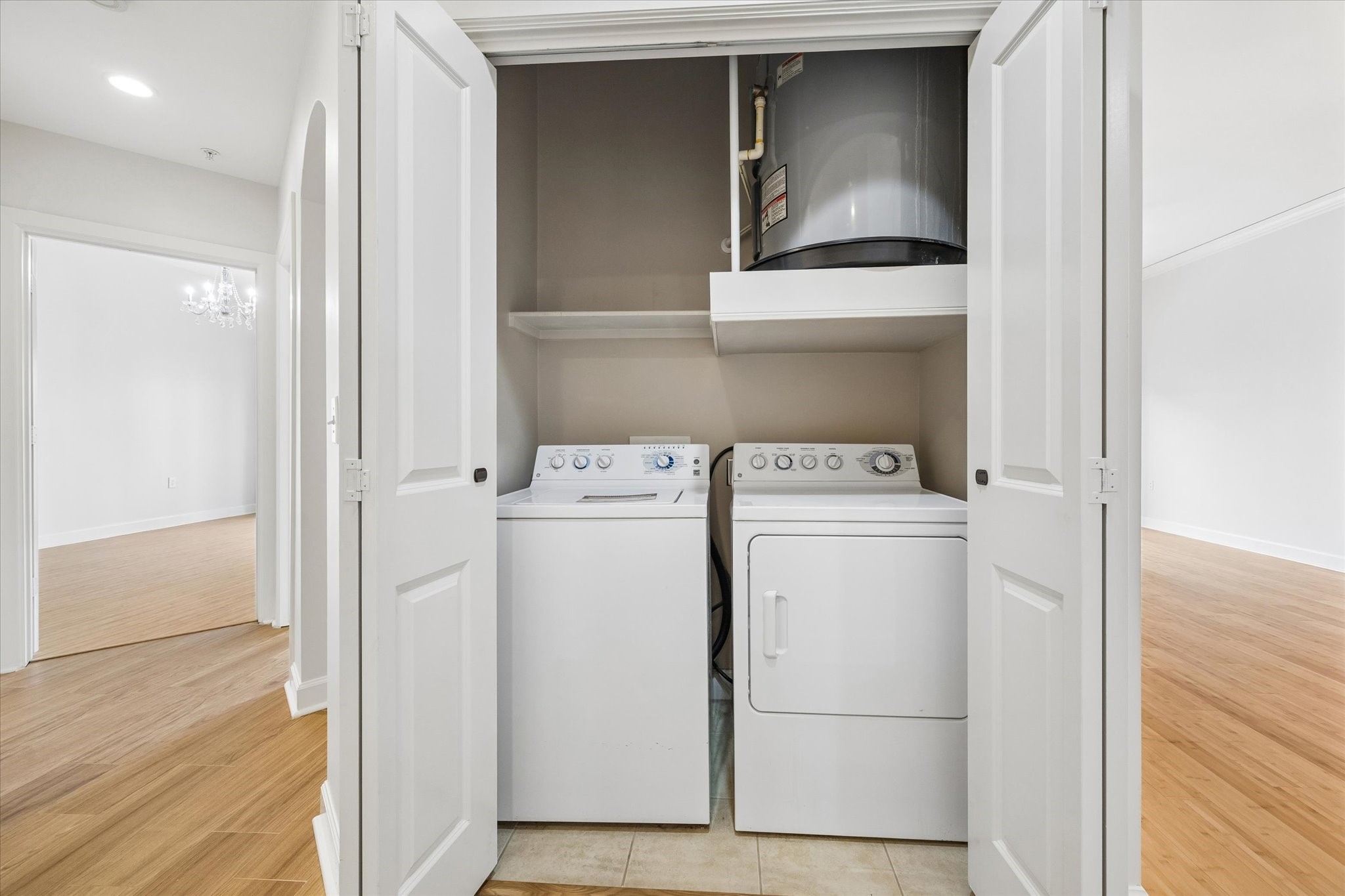100 Willard Street, Unit 15 Houston, TX 77006 - Photo 20 of 25 Utility closet with full size washer and dryer included.