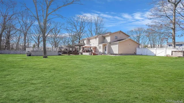 a bathroom with a sink toilet and a mirror