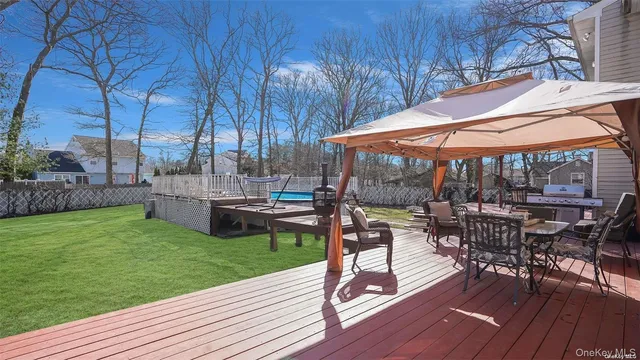 a view of outdoor space yard deck patio and swimming pool