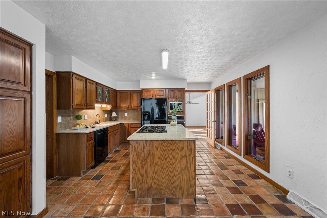 French door leads to 4 season sunroom.