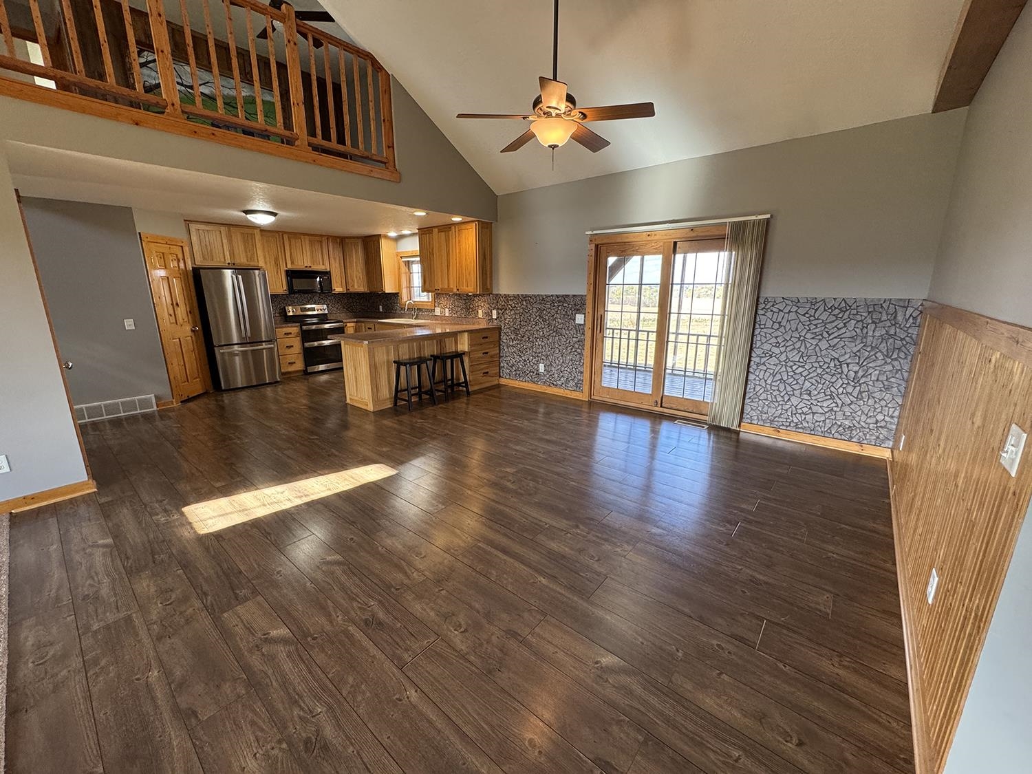 7876 Hickory Grove Road Savanna, IL 61074 - Photo 24 of 67 a view of a livingroom with furniture and a kitchen