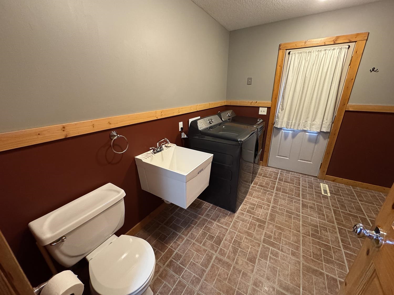 7876 Hickory Grove Road Savanna, IL 61074 - Photo 35 of 67 a bathroom with a sink toilet and mirror