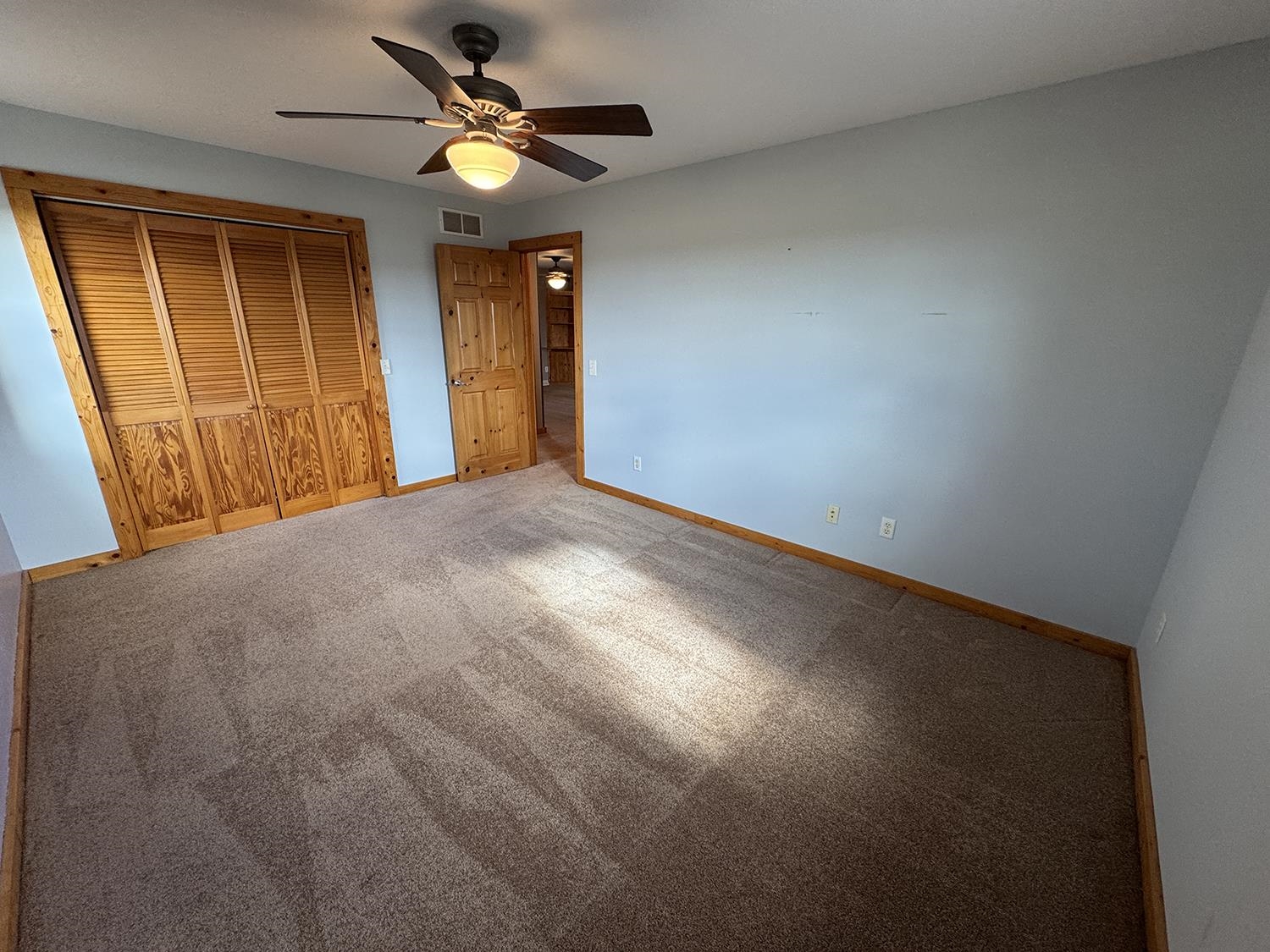 7876 Hickory Grove Road Savanna, IL 61074 - Photo 40 of 67 a view of an empty room with a window