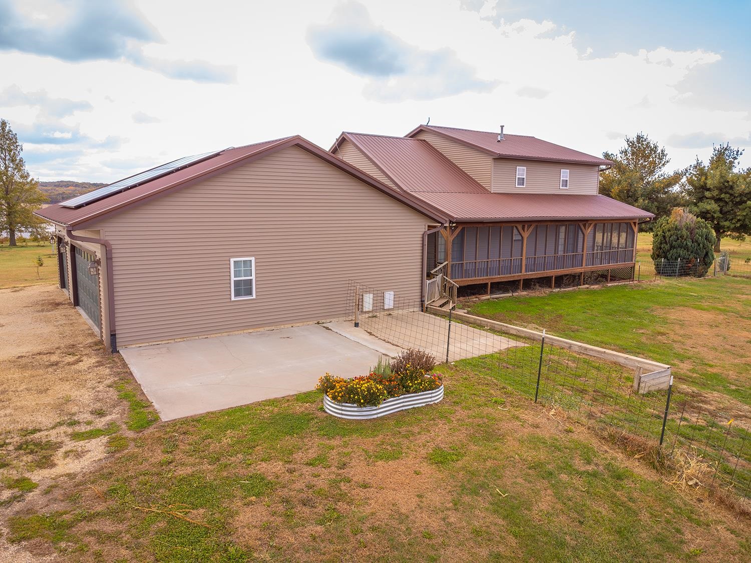 7876 Hickory Grove Road Savanna, IL 61074 - Photo 7 of 67 a view of a house with backyard and sitting area