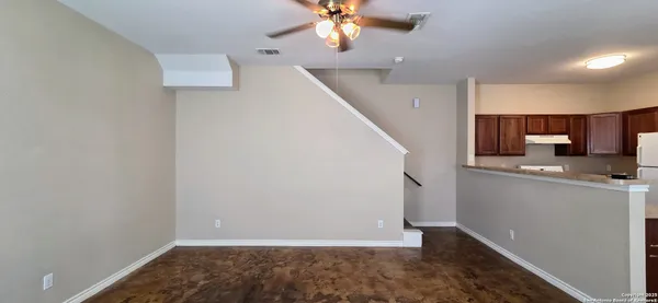a view of a kitchen with a sink and dishwasher