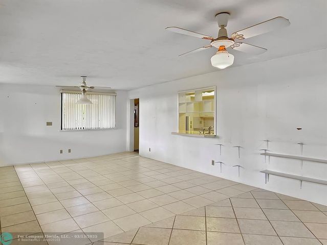 a bathroom with a tub and toilet