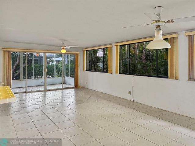 a kitchen with cabinets and appliances