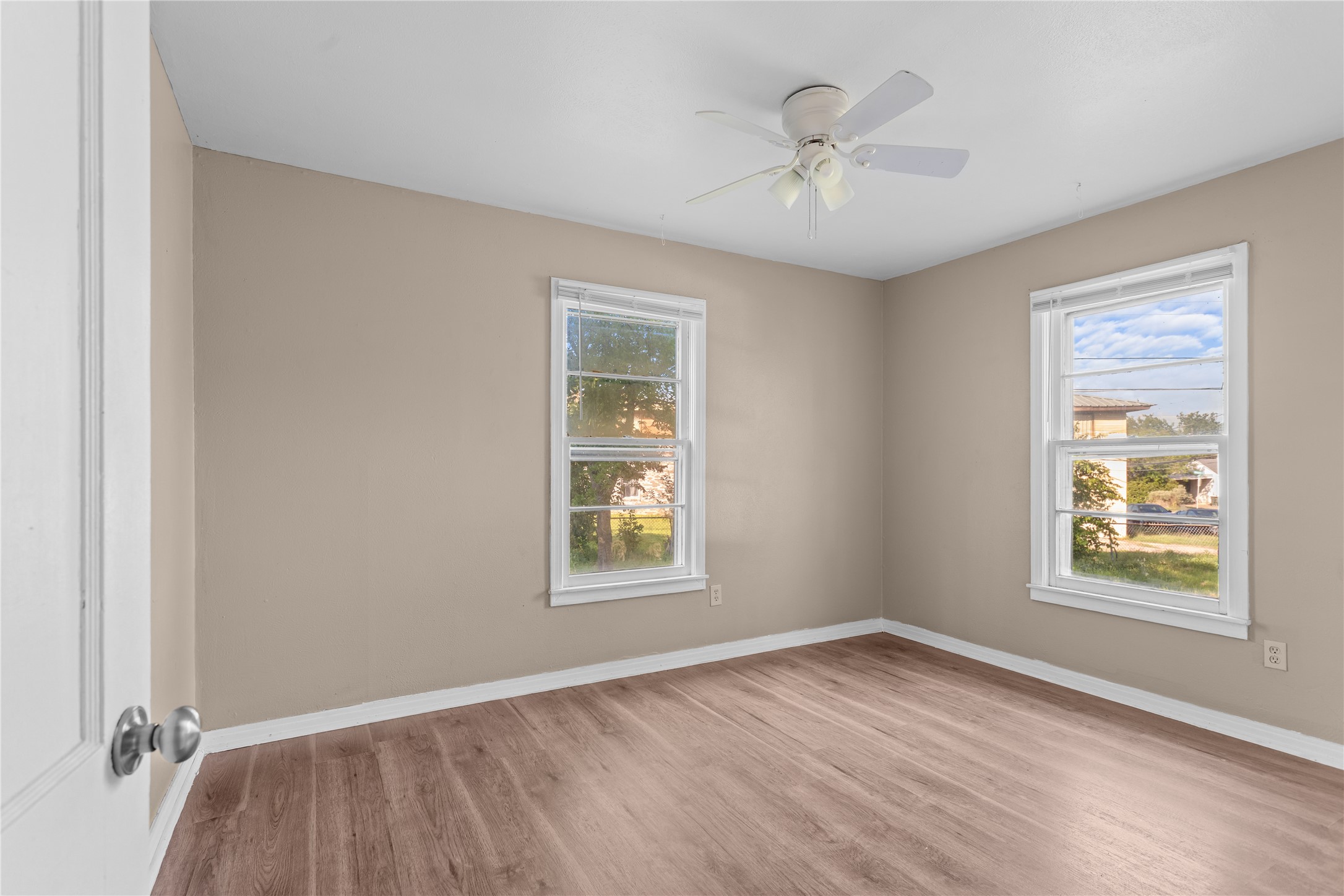 801 Evetts Road Killeen, TX 76541 - Photo 11 of 16 A quiet bedroom featuring durable laminate flooring and a ceiling fan for year-round comfort.