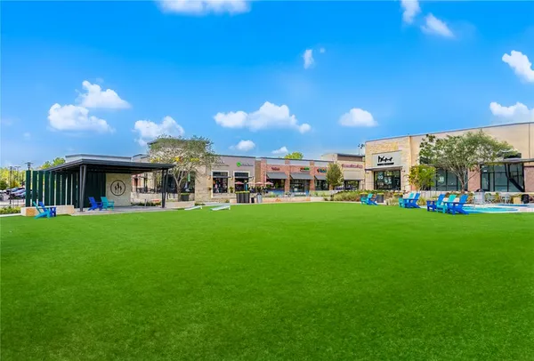a view of a house with a big yard
