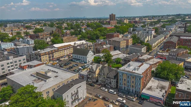 a view of a city with a mountain