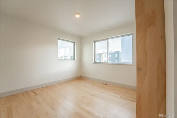 an empty room with windows