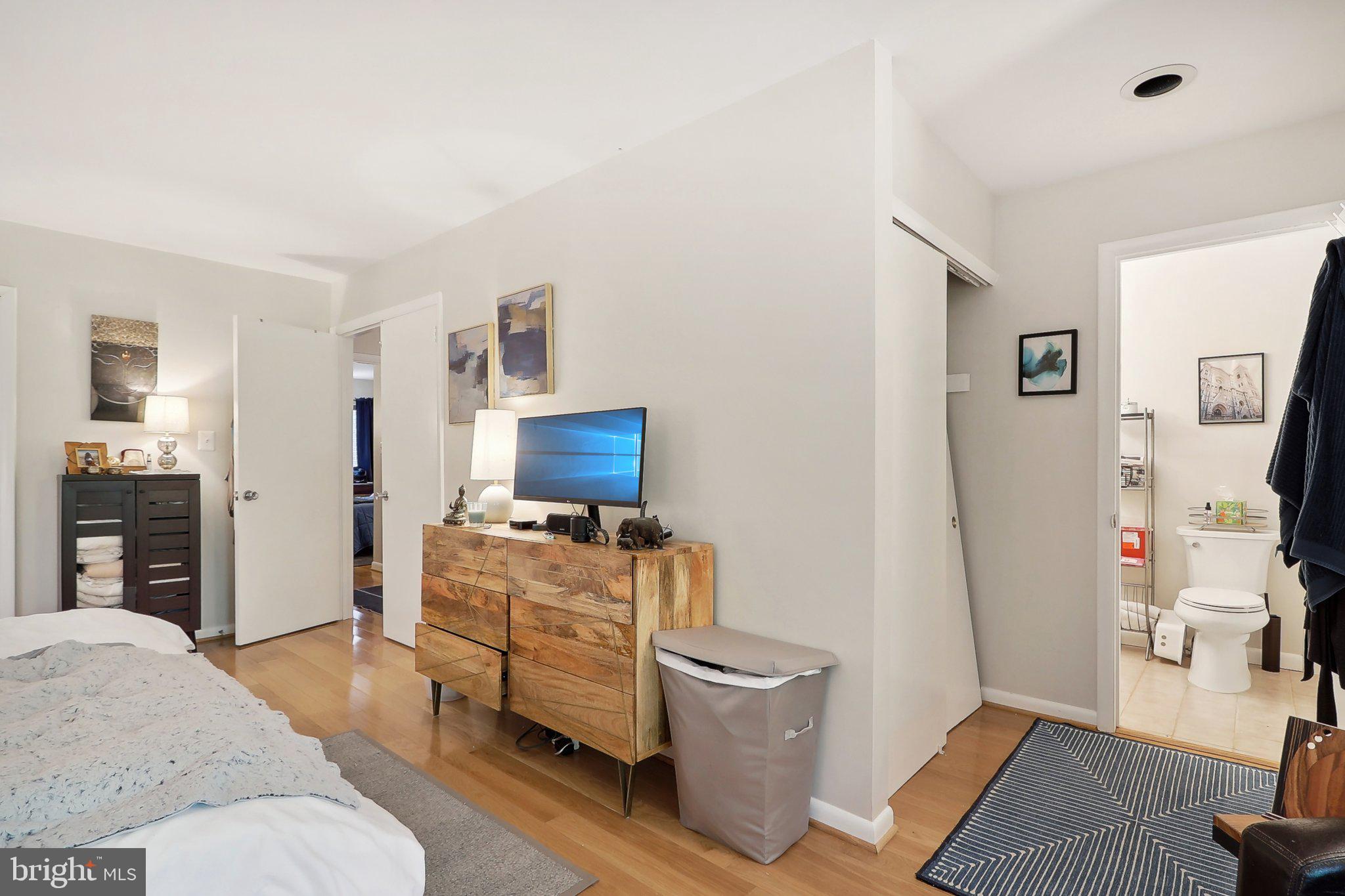 2031 Approach Lane Reston, VA 20191 - Photo 38 of 58 Cozy bedroom with modern touches.