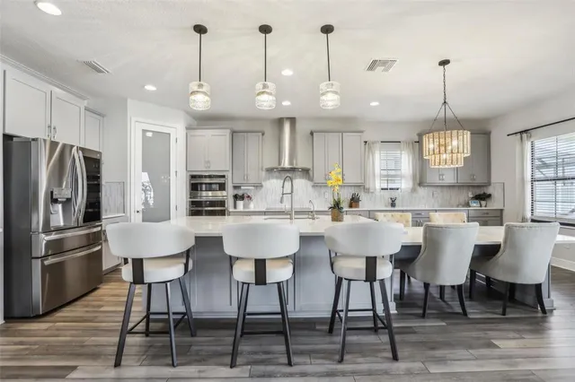 a view of entryway with wooden floor and stairs