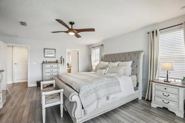 an aerial view of a house with a big yard