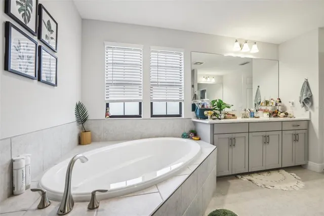 an aerial view of a house with a ocean view