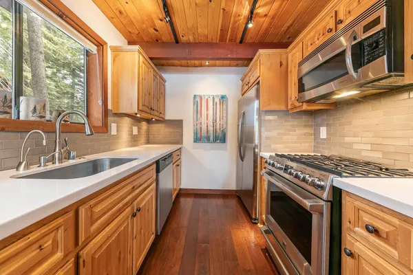 a bedroom with a bed and a mirror