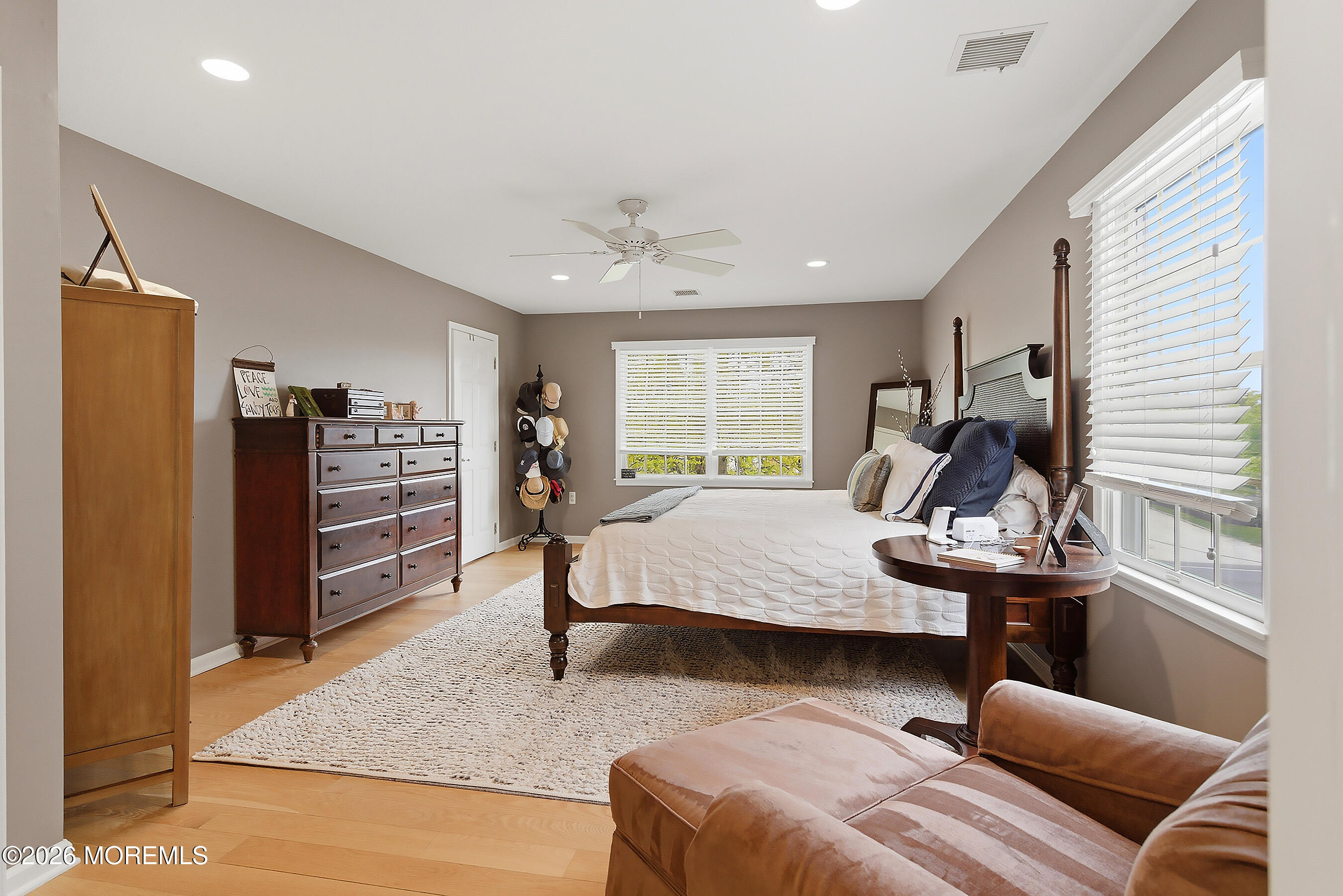 924 Ocean Road Point Pleasant, NJ 08742 - Photo 24 of 56 a living room with furniture and a flat screen tv