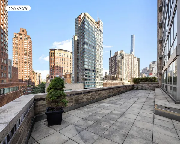 a view of city with tall buildings