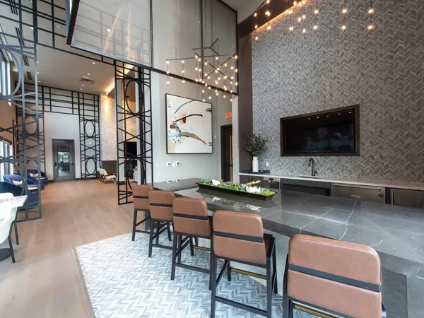 a living room with fireplace furniture and a flat screen tv