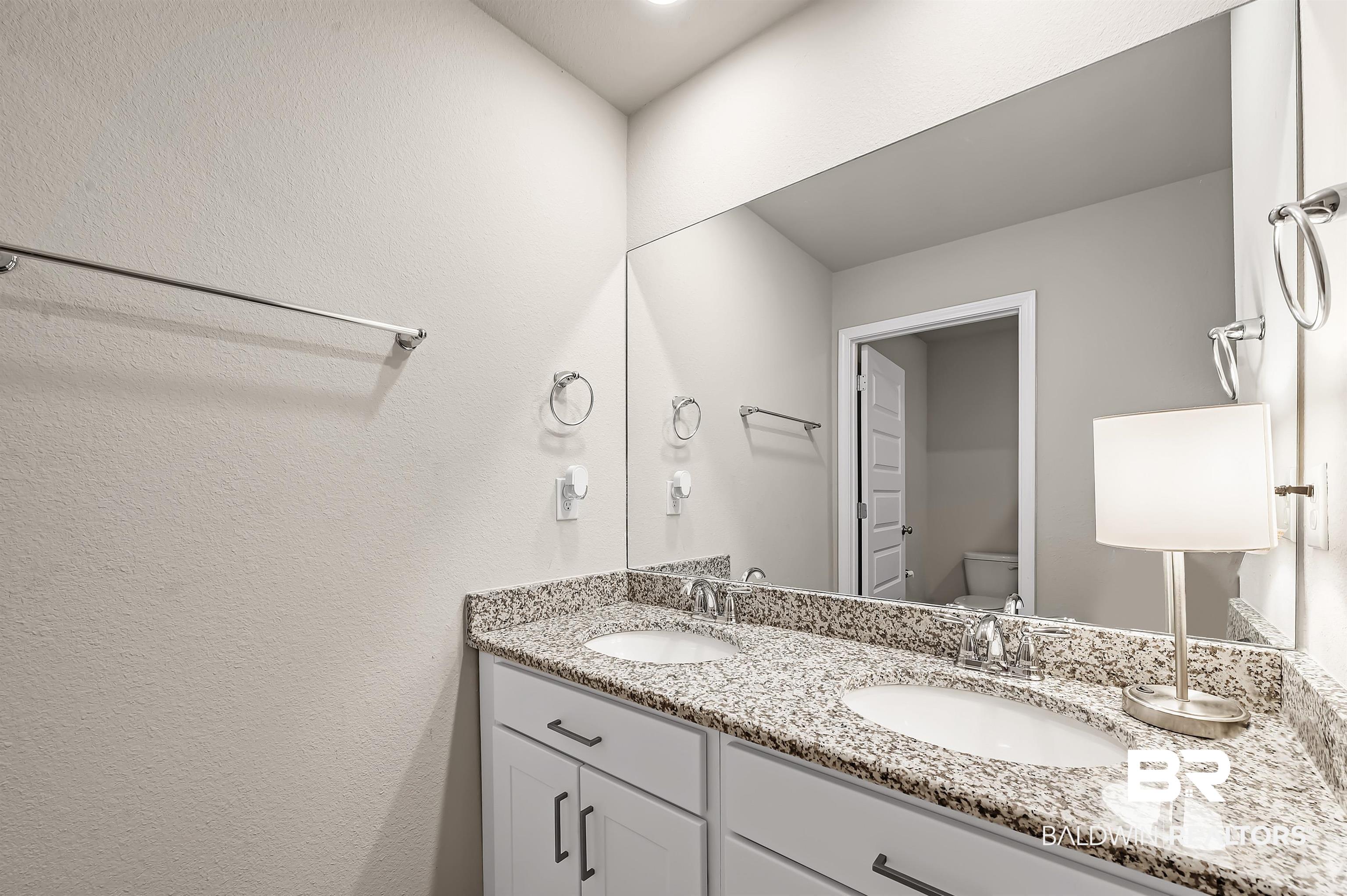 24549 Broken Sound Loop Orange Beach, AL 36561 - Photo 35 of 57 Bathroom featuring vanity and toilet