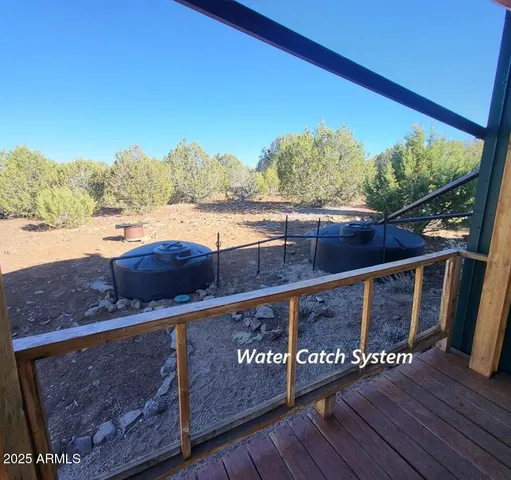 a view of swimming pool from a balcony